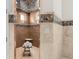Shower includes a decorative tiled ceiling, built in shelves, and brown tile at 13206 Lewis Raulerson Road, Dover, FL 33527