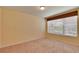 Inviting bedroom with soft natural light, neutral carpet, and a window, providing a peaceful retreat at 2128 River Turia Cir # 2128, Riverview, FL 33578