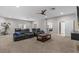 Spacious living room with comfortable seating and a view to the rest of the house at 2136 Pinnacle N Cir, Palm Harbor, FL 34684