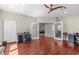 Office space with multiple desks, hardwood floors, and french doors to other rooms at 2136 Pinnacle N Cir, Palm Harbor, FL 34684