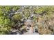 Aerial view of a charming neighborhood showcasing the property's location and surrounding greenery at 2410 E Palifox St, Tampa, FL 33610