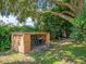 Outdoor shed with bikes and extra storage at 2523 Blackwood Cir, Clearwater, FL 33763
