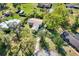 Aerial view of the home surrounded by mature trees and lush landscaping at 2903 Oak Crest Dr, Plant City, FL 33565