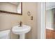Bathroom featuring an ornate framed mirror and vintage style sink with hardware at 2903 Oak Crest Dr, Plant City, FL 33565