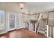 Inviting foyer featuring a grand staircase, decorative lighting, and tiled flooring at 2903 Oak Crest Dr, Plant City, FL 33565