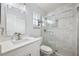Modern bathroom with glass-enclosed shower and sleek vanity for a spa-like experience at 311 Poinsettia Rd, Anna Maria, FL 34216