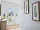 A shot of the home's entrance showcasing its natural lighting at 311 Poinsettia Rd, Anna Maria, FL 34216