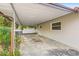 Carport of the property with concrete ground at 360 22Nd Ne Ave, St Petersburg, FL 33704