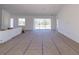 Spacious living room under construction with large sliding glass doors leading to the outdoors at 4280 Cape Haze Dr, Placida, FL 33946