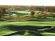 Picturesque golf course featuring rolling green hills and sand traps at 5047 Summit View Dr, Brooksville, FL 34601