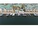 Aerial view of a waterfront community with boat docks and a swimming pool at 6327 Sunset Bay Cir, Apollo Beach, FL 33572