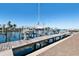 Waterfront property featuring a private dock with boat lifts and picturesque water views at 6327 Sunset Bay Cir, Apollo Beach, FL 33572