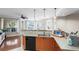 Kitchen with granite countertops, modern appliances, and eat-in bar at 6327 Sunset Bay Cir, Apollo Beach, FL 33572