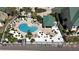 Aerial shot of a community pool featuring lounge chairs, lush landscaping and a gazebo at 6327 Sunset Bay Cir, Apollo Beach, FL 33572