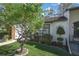 Manicured front yard with lush lawn and decorative plantings adding curb appeal at 6395 Pinestand Ct, Spring Hill, FL 34606