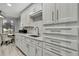 Updated kitchen features ample cabinet space, modern fixtures, and a cozy breakfast nook nearby at 6395 Pinestand Ct, Spring Hill, FL 34606