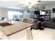 Open concept kitchen with granite counters overlooking the living room at 6494 Beverly Hills Dr, Zephyrhills, FL 33541