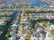 Waterfront community featuring homes with boat docks and canals surrounded by ocean views at 6606 Dolphin Cove Dr, Apollo Beach, FL 33572
