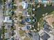 Bird's eye view of a waterfront community and property with a pool, private dock, and boat lift at 6606 Dolphin Cove Dr, Apollo Beach, FL 33572