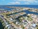 This is an aerial of the waterfront homes, boat docks, canals, and ocean views within the surrounding community at 6606 Dolphin Cove Dr, Apollo Beach, FL 33572
