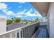 Balcony view overlooking waterfront property with boat access and clear blue skies at 6606 Dolphin Cove Dr, Apollo Beach, FL 33572