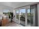 Balcony with views of the nearby waterway and neighborhood landscaping at 6606 Dolphin Cove Dr, Apollo Beach, FL 33572