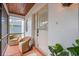 Charming front porch with comfortable seating area at 6606 Dolphin Cove Dr, Apollo Beach, FL 33572