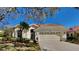 Charming single-story home with a two-car garage and well-maintained landscaping at 6805 Winslow St, Sarasota, FL 34243