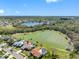 The property is located on a serene lake at 8640 Chadwick Dr, Tampa, FL 33635