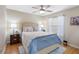 Inviting bedroom featuring a ceiling fan, soft colors, and a peaceful atmosphere at 8640 Chadwick Dr, Tampa, FL 33635