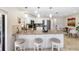 Bright kitchen featuring stainless steel appliances, granite countertops, and bar seating at 8640 Chadwick Dr, Tampa, FL 33635