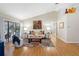 Bright living room with vaulted ceilings, hardwood floors, and stylish decor at 8640 Chadwick Dr, Tampa, FL 33635