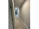 Clean hallway with tile floors leading to other rooms in the house at 953 Crosswind Ave, Sarasota, FL 34240