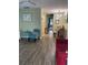 Comfortable dining area with modern flooring, a small table and charming wall decor at 11201 80Th Ave # 305, Seminole, FL 33772