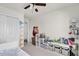 bedroom with closet and ceiling fan at 14925 Promenade Pkwy, Odessa, FL 33556