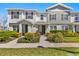 Charming townhome with neat landscaping and inviting front entrances at 14925 Promenade Pkwy, Odessa, FL 33556