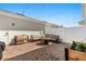 Brick patio with string lights and lounge seating at 14925 Promenade Pkwy, Odessa, FL 33556