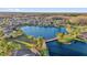 Aerial view featuring a pond and neighboring homes at 14925 Promenade Pkwy, Odessa, FL 33556