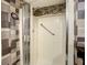 Modern bathroom shower with updated shower head and grab bar at 1655 S Highland Ave # G164, Clearwater, FL 33756