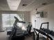 On-site gym featuring a treadmill, weights, and bike for convenient workouts at 1655 S Highland Ave # G164, Clearwater, FL 33756