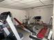 Fully equipped gym with weight machines, treadmill, and exercise bike to help you stay fit at 1655 S Highland Ave # G164, Clearwater, FL 33756