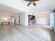 Bright, open living room shows updated flooring and a seamless transition to the kitchen at 1655 S Highland Ave # G164, Clearwater, FL 33756