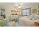 Well-lit bedroom featuring large window with lots of natural light at 206 Glenellen Pl, Sun City Center, FL 33573