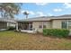 Well-maintained backyard with a lanai at 2129 Acadia Greens Dr, Sun City Center, FL 33573