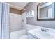 Bathroom featuring a shower-tub combination, single sink vanity, and storage at 22240 Stillwood Dr, Land O Lakes, FL 34639