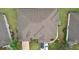 Aerial view of the home and property, showcasing roof and landscaping at 2243 Worthington Greens Dr, Sun City Center, FL 33573