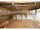 Inside of a barn area with built-in saddle racks and secure fencing at 25590 Olympia Rd, Brooksville, FL 34601