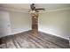 Comfortable living room featuring updated flooring and neutral paint, creating a bright and airy space at 25590 Olympia Rd, Brooksville, FL 34601