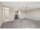 Upstairs bonus room with neutral walls and carpet, and a ceiling fan at 30280 Southernwood Ct, Wesley Chapel, FL 33543