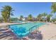 Large community pool with slides, lush landscaping, and resort-style amenities for residents at 30280 Southernwood Ct, Wesley Chapel, FL 33543